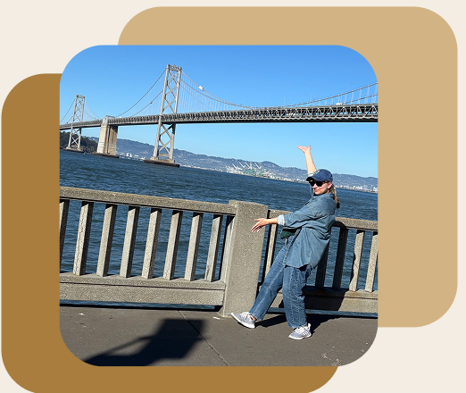 Mirreille posing in front of the Bay Bridge in San Francisco